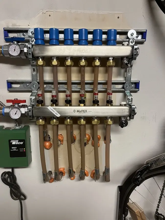 Plumber performing Water Heater Repair at a residential property in Maryville